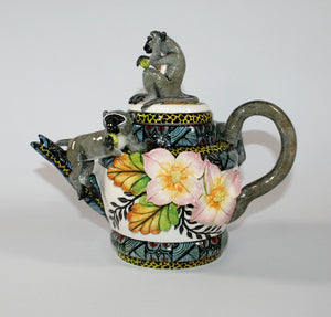 Teapot with monkey trio