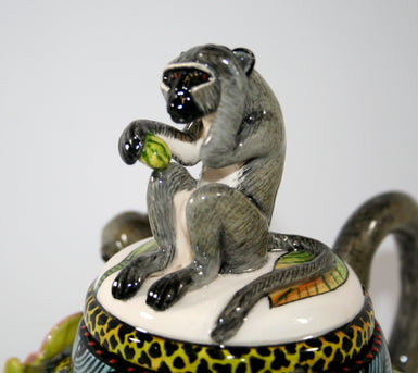 Teapot with monkey trio