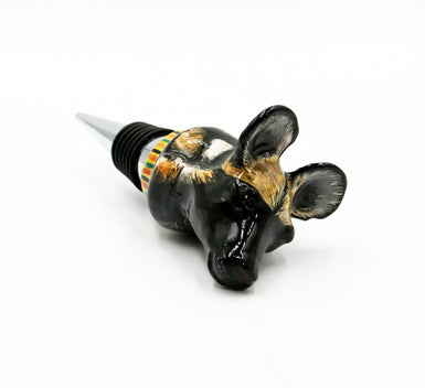 Wild dog with green, orange & black stripes on yellow wine bottle stopper