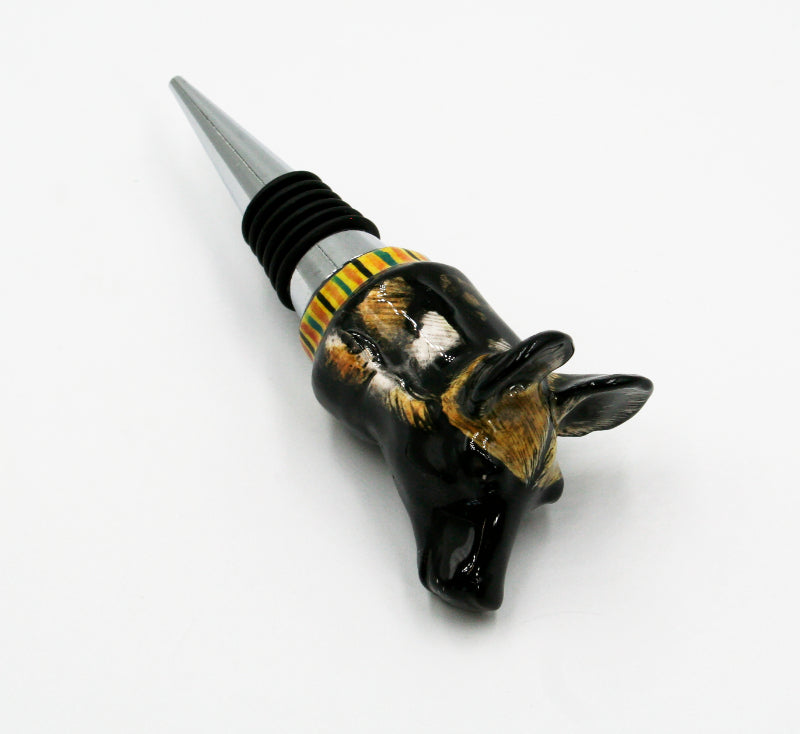Wild dog with green, orange & black stripes on yellow wine bottle stopper