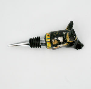 Wild dog with green, orange & black stripes on yellow wine bottle stopper