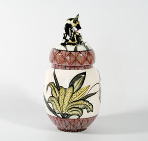 Wild dog on lid cookie jar