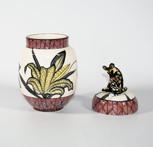 Wild dog on lid cookie jar