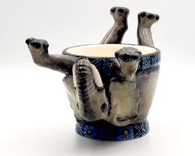 Upside down elephant ring bowl