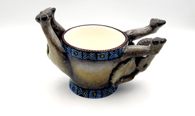 Upside down elephant ring bowl