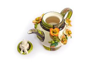 Teapot with white elephant on lid