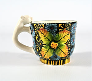 Blue circle mug with flower
