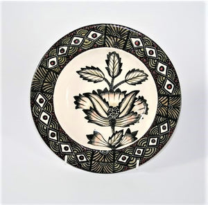 Wide Flat rim bowl with black , olive, red & white pattern