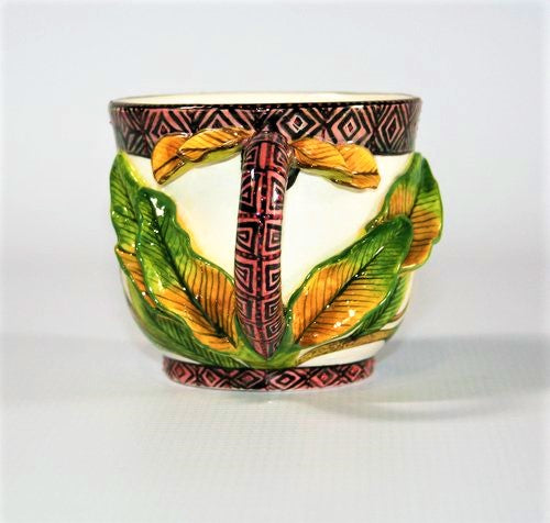 Painted bird & flower mug with sculpted leaves