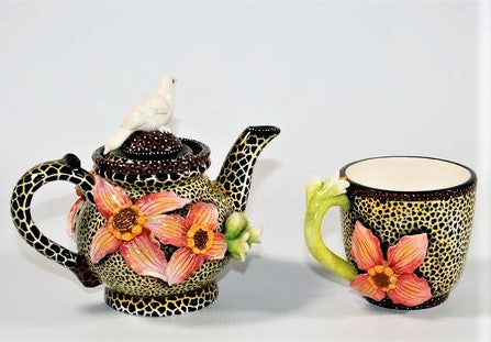 Tea pot with pink flower and white bird & cup