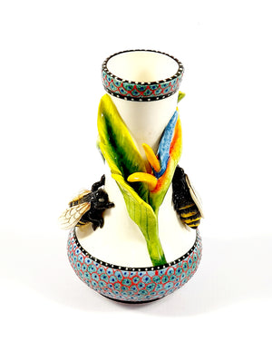 Bee and flower on white vase