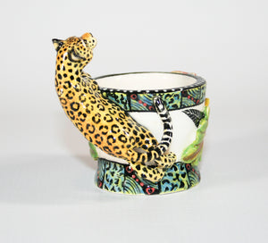 Leopard eggcup with red and yellow flower