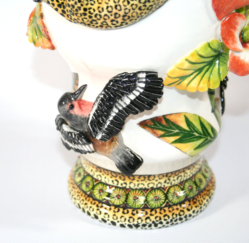 Large vase with leopard handles & sculpted birds & flowers