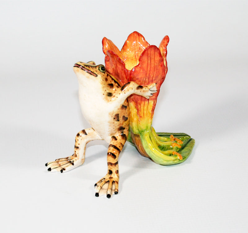 Brown frog with orange and yellow lily toothpick holder