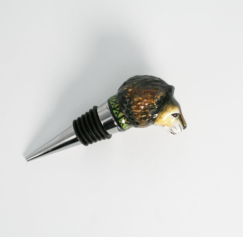 Lion with green X and dot pattern wine bottle stopper small