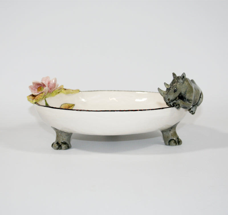 Large decorative bowl on legs with rhino