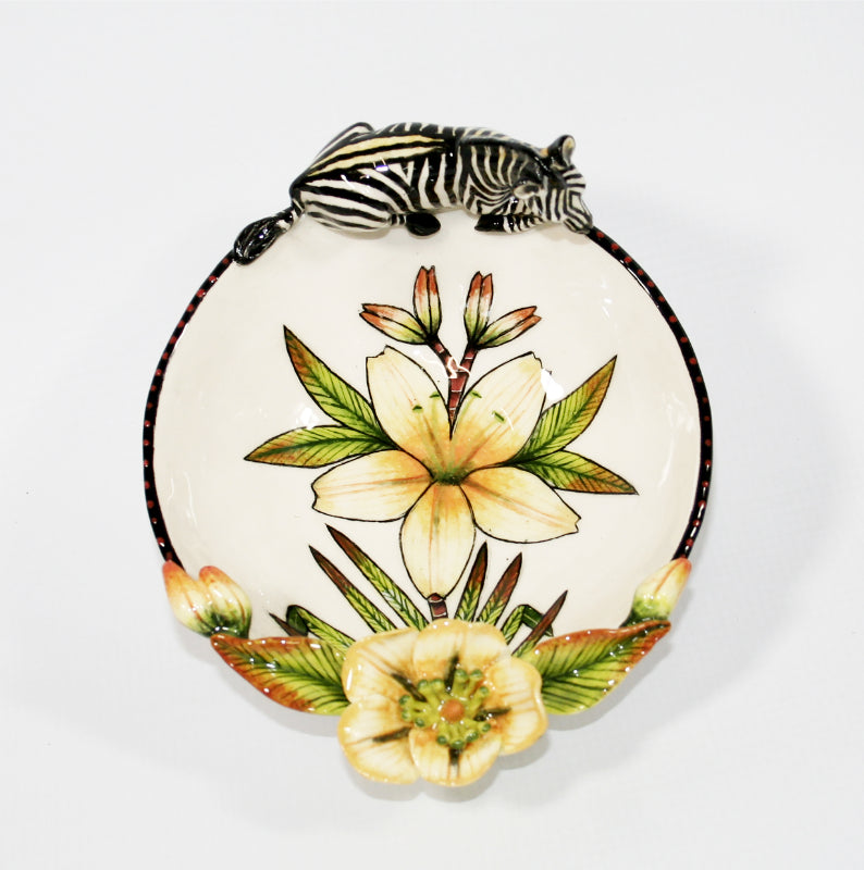 Small decorative bowl on legs with zebra