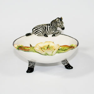 Small decorative bowl on legs with zebra