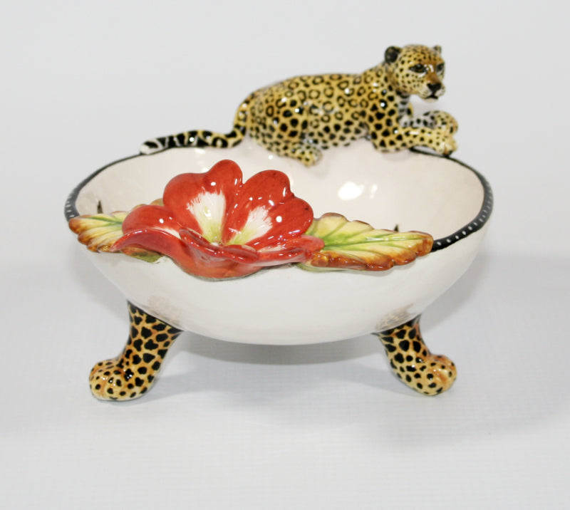 Small decorative bowl on legs with leopard