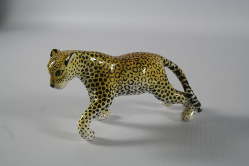 Extra small walking leopard