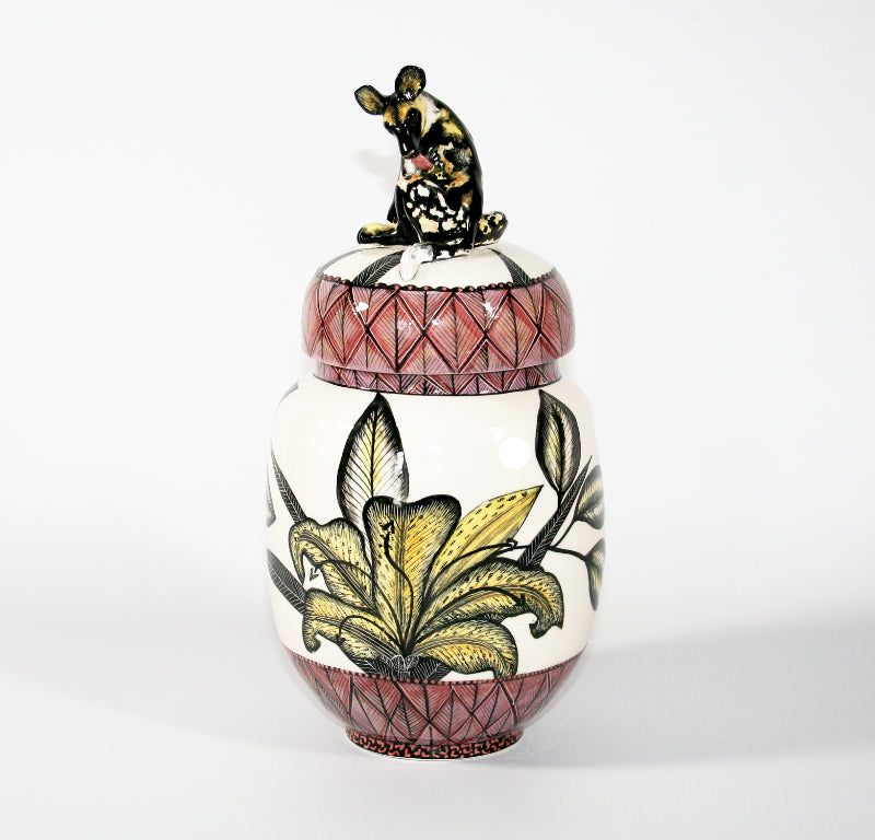 Wild dog on lid cookie jar