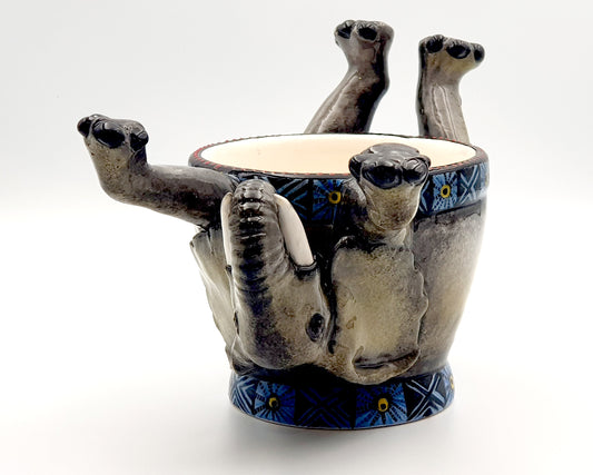 Upside down elephant ring bowl