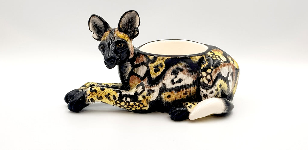 Wild dog candle holder