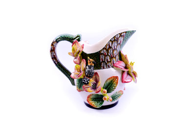 Flower jug with green handle