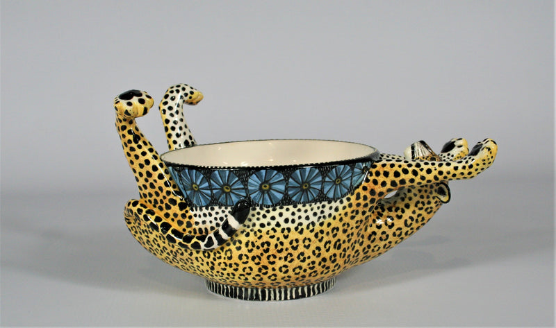 Upside dowl leopard bowl with patterned blue rim
