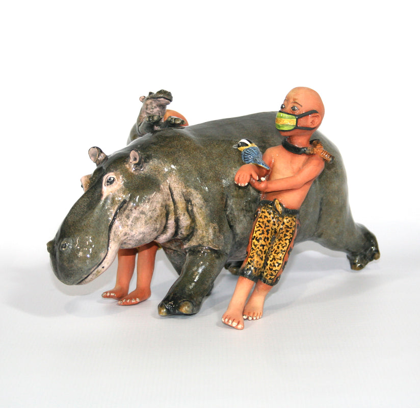 Hippo and calf with masked shepherds