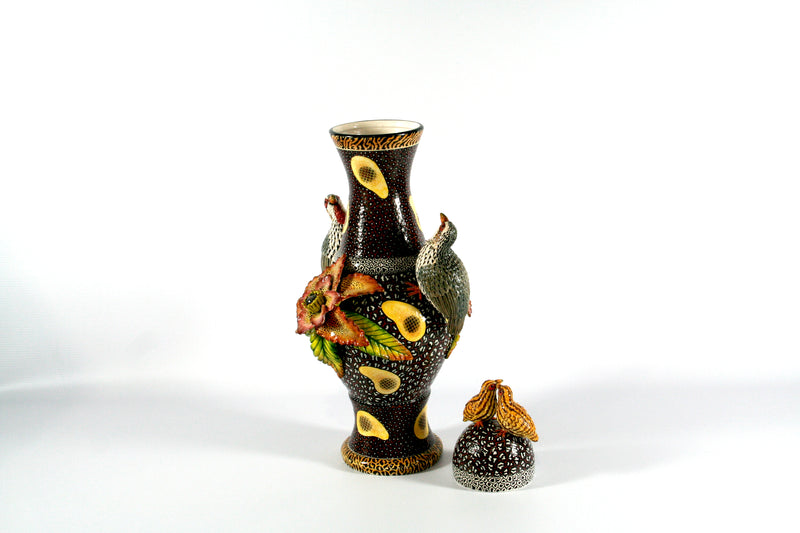 Francolin and salmon flowers vase