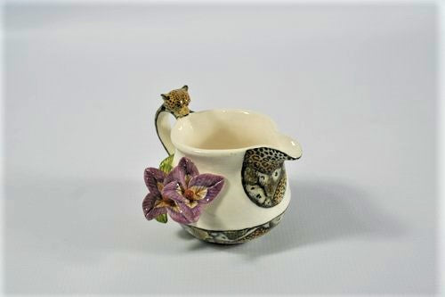 Leopard handle with flower and bird jug