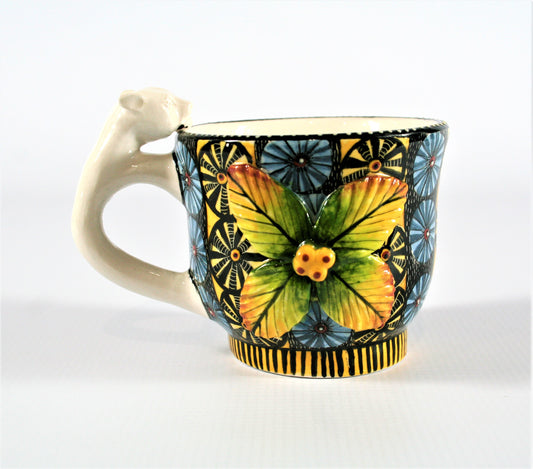 Blue circle mug with flower