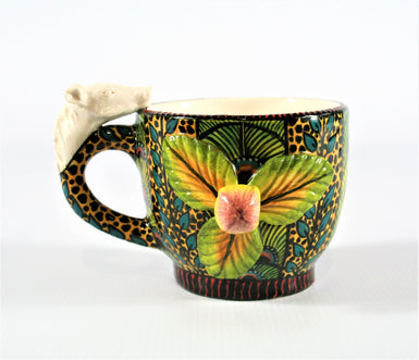 Leopard print and Turquoise leaf mug with warthog on handle