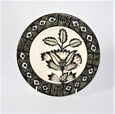 Wide Flat rim bowl with black , olive, red & white pattern