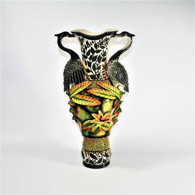 Heron handles large vase with black leaves
