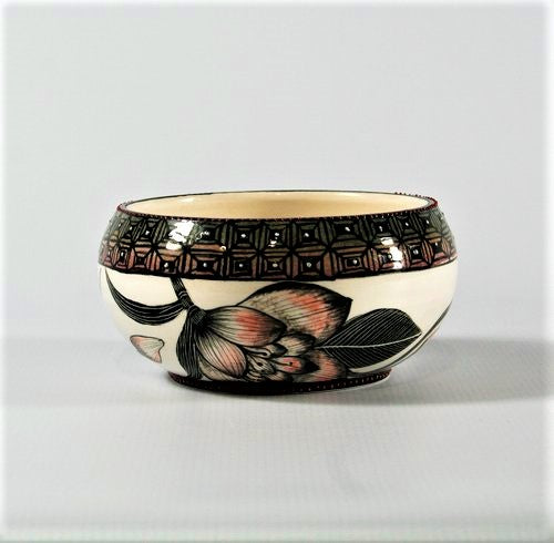 Androcybium Striatum Orange & black flower bowl