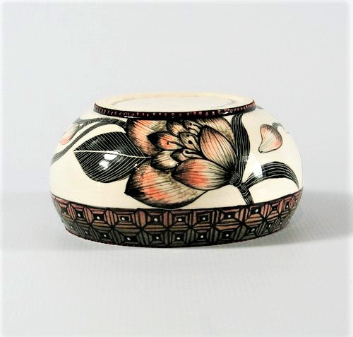 Androcybium Striatum Orange & black flower bowl
