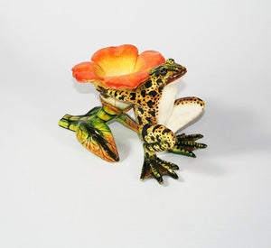 Brown frog with orange petals candlestick