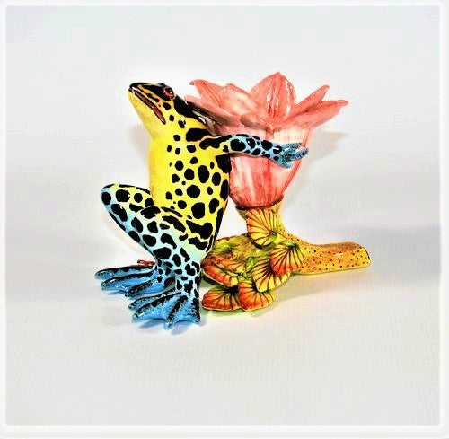 Blue & green leopard frog with open pink petal candlestick