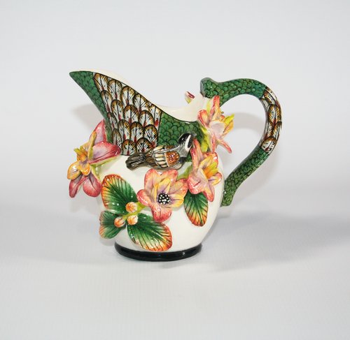 Flower jug with green handle