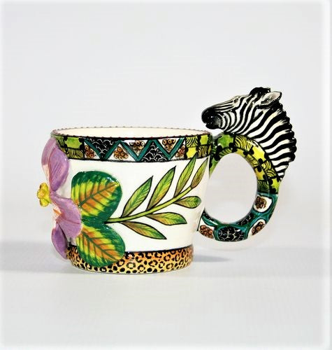 Coffee pot and three mugs with animal handles
