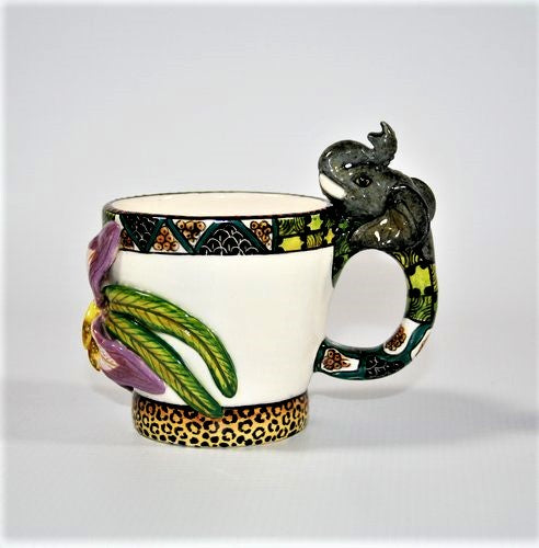 Coffee pot and three mugs with animal handles