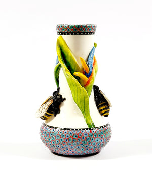 Bee and flower on white vase
